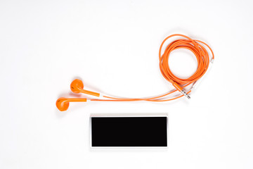 orange color earphone with music player on white background.