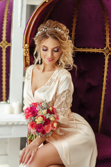 Obraz na płótnie Canvas Portrait of beautiful bride. Blonde girl with curly hair and fashion makeup.