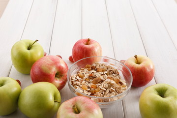 Healthy morning meals with muesli and apples