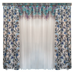 Straight curtains with a floral pattern on the fabric and a light tulle from thin transparent organza patterned on the top edge