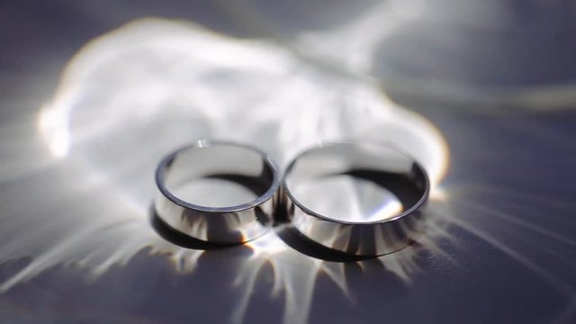 Beautiful silver background with wedding rings