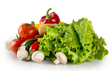 Fresh raw vegetables and lettuce isolated on white background