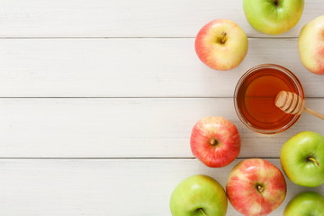 Seasonal harvest background with apples and honey