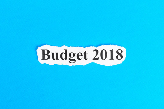 BUDGET 2018 text on paper. Word BUDGET 2018 on torn paper. Concept Image