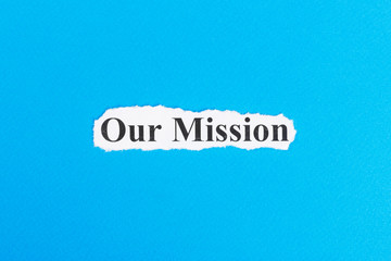Our Mission text on paper. Word Our Mission on torn paper. Concept Image