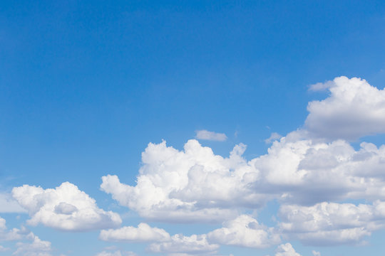 white clouds in the blue sky © getcloser