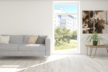 Idea of white room with sofa and summer landscape in window. Scandinavian interior design. 3D illustration