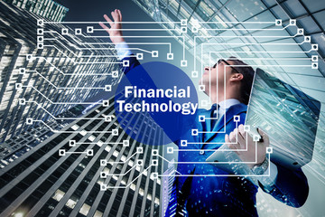 Businesswoman with laptop in financial technology fintech concep