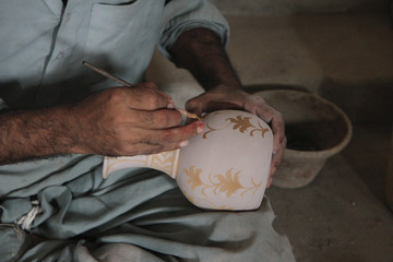 Traditional pottery painting in Sindh province, Pakistan