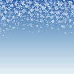 Snowflakes Falling on Blue Background