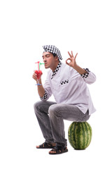 Young male cook with watermelon isolated on white