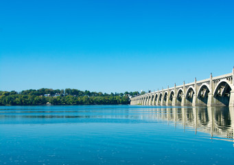 Fototapeta na wymiar Blue Susquehanna River/The beautiful blue sky matching the amazingly blue waters of the Susquehanna River.