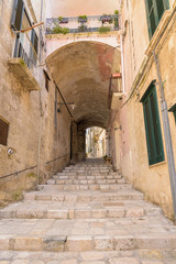 Fototapeta na wymiar Narrow streetin the Sassi of Matera