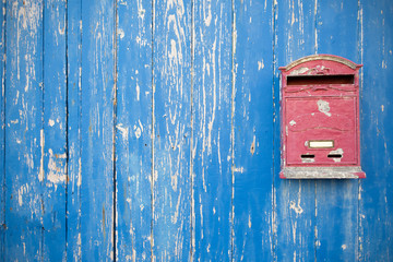 Letter Box On Blue Wood Door