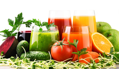 Glasses with fresh organic vegetable and fruit juices