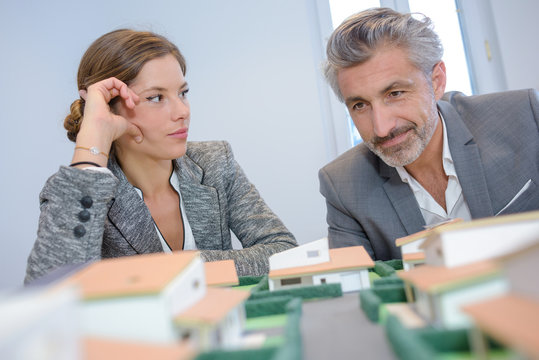 Woman looking contemptuously at housing developer