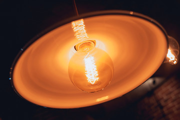 Loft pendant lamps with edison light bulbs.