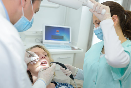 dentist checking up a patient