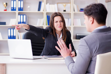 Business meeting between businessman and businesswoman
