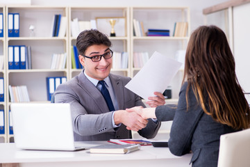 Business meeting between businessman and businesswoman