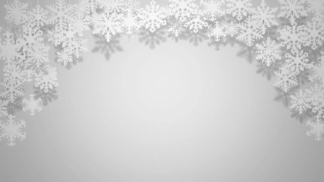 Beautiful paper snowflakes swinging on white background Christmas greeting card animation background (space for text)