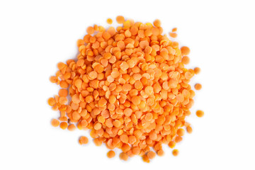 Pile of red lentils isolated on white background.
