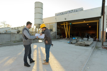 workers outside of a factory