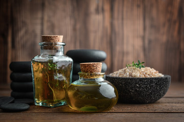 Obraz na płótnie Canvas Massage oil in vintage bottle