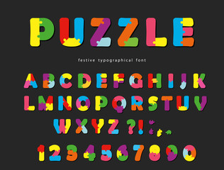 Puzzle font. ABC colorful creative letters and numbers on a black background.