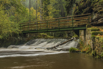 Bridge over Chribska Kamenice river in national park Ceske Svycarsko