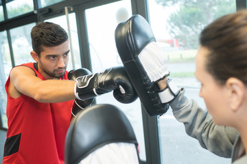 man exercising together at the health club