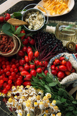 Medicinal plants and herbs composition: Dog rose, bunch branch Rosehips, types Rosa canina hips, essential oil. bunch,  dried flowers of linden and chamomile elderberries and goji berries.  