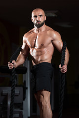 Fototapeta na wymiar Fitness Battling Ropes At Gym Workout Fitness Exercise