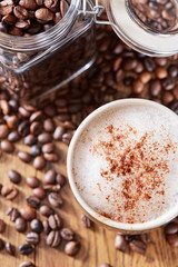 Aroma coffee chocolate cookies and spices on the wooden table. Dark wooden background. Top view. Close. Closeup.
