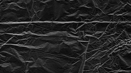 Crumpled black paper