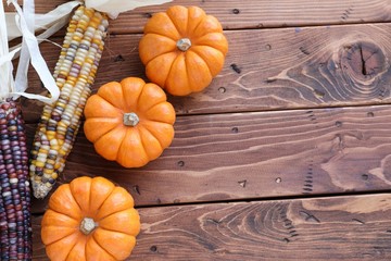Pumpkins on wood surface