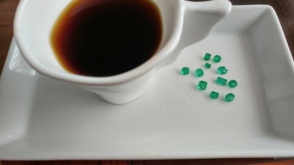 coffee cup with Colombian emeralds and  jade , jewelry 
