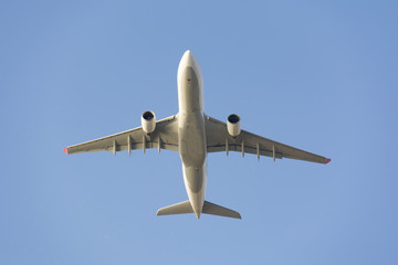 passenger airplane on blue sky composition photography
