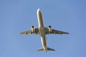 passenger airplane on blue sky composition photography