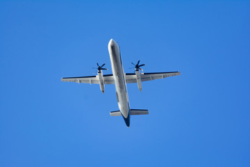 passenger airplane on blue sky composition photography