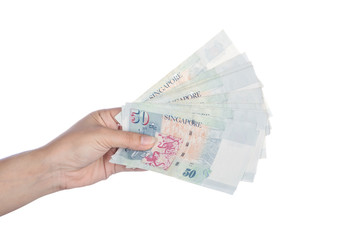 hand with Singapore banknotes dollars (50 SGD) isolated on white background