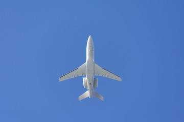 private jet airplane on blue sky composition photography