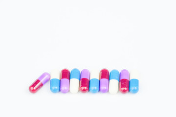 antibiotic drug capsule on white background