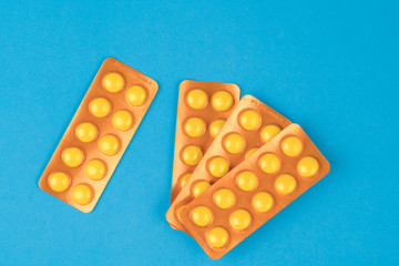 panels of drug capsules on white background.