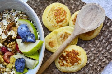 sports nutrition, a serving of cereal with fruit for the health of the athlete , Breakfast is on the table