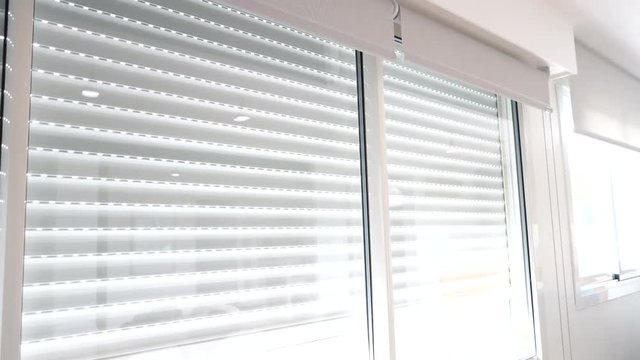 Woman using smartphone to control electric shutter
