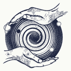 Magic hands and universe tattoo and t-shirt design. Universe symbol, space travel, house of mankind, Earth in space, galaxies, milky way © intueri