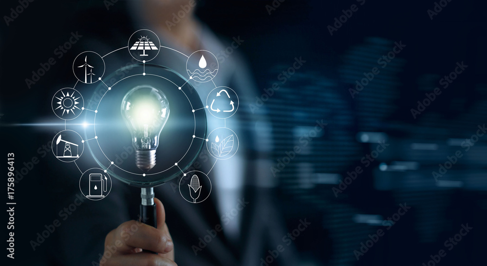Canvas Prints man holding magnifying glass and light bulb ,searching global show the world's consumption with icon
