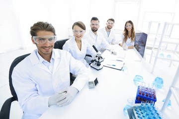 Fototapeta premium Male scientist and the team in the lab.
