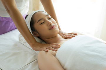 Fototapeta na wymiar Young woman getting body massage at spa.